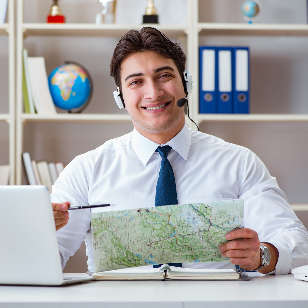 Travel agent helping a customer